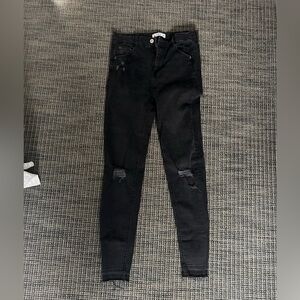 Pull and Bear skinny jeans with rips on knees.